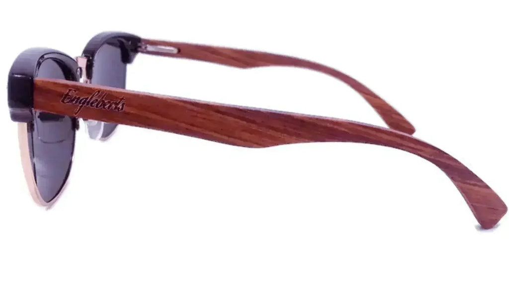 Side view of walnut wood polarized club sunglasses showing engraved temple