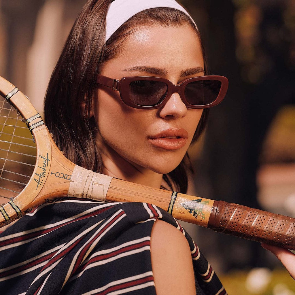 Daphne by DIFF Polarized Sunglasses in Rugby Red Lifestyle View